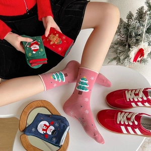 Colorful cartoon Christmas crew socks with Santa Claus and tree patterns for women