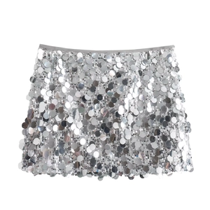Silver sequin mini skirt featuring large round sequins and a high-waisted A-line silhouette