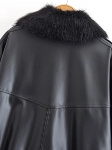 Detail view of back of black PU leather jacket with premium faux fur collar trim
