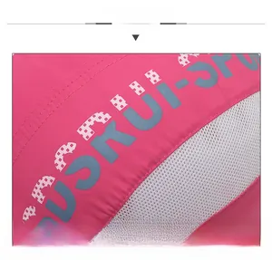 Detail of rose red quick-dry baseball cap featuring breathable side mesh and fine stitching