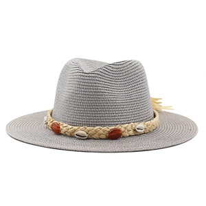 Fashionable dark grey straw sun hat with bohemian shell band and tassels for beach vacation