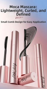 Detail shot of the fine comb brush head on a pink metallic waterproof mascara wand