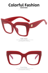 Detailed front and side views of large square cat-eye glasses with red frames and gold rivets