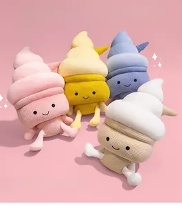Detail of cute plush ice cream pillows with smiling faces in four pastel colors