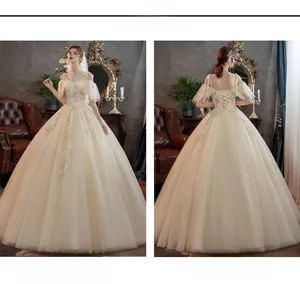 Vorder- und Rückansicht des champagnerfarbenen Hochzeitskleides mit Spitze