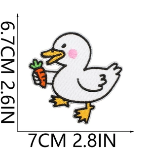 Detail view showing dimensions of cute embroidered white duck patch with carrot