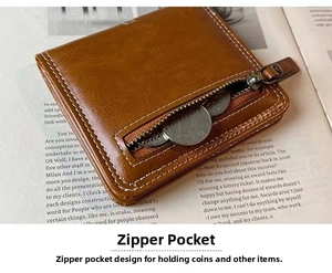 Brown vintage faux leather mini wallet featuring a zipper coin pocket on a magazine background