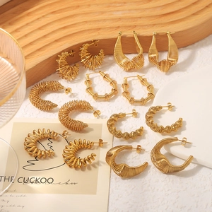 Set of 18K gold plated stainless steel hoop earrings with textured spiral and twisted designs