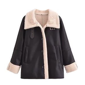 Flat lay of women's black faux leather jacket with beige faux fur lining and wide collar