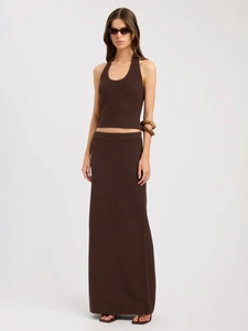 Chic dark brown knit two-piece set with halter neck crop top and high-waist maxi skirt