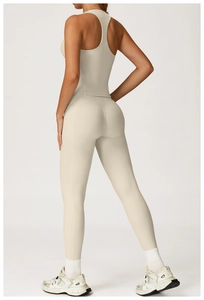 Detail view of high-waist yoga leggings with side pockets and V-shape lift seam design