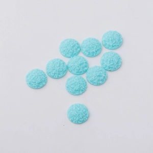 Detailed view of 12mm light blue round resin druzy stones with glittering texture