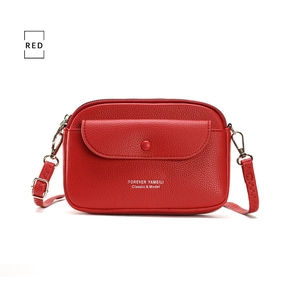 Detailed view of red lychee textured leather mobile phone bag with silver metal hooks