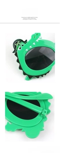 Detailed view of durable metal hinges on cute green crocodile kids sunglasses