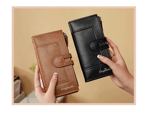 Detail view of premium long leather wallets in brown and black with secure zip and snap closure