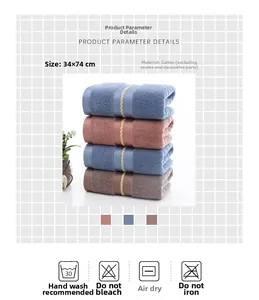 Detail view of 34x74cm pure cotton towels with soft loop texture and washing icons