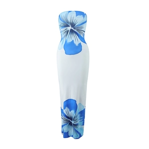 Detail view of white strapless maxi dress with large blue floral prints and slim fit
