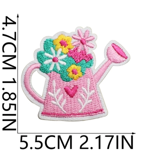 Macro shot of embroidered flower pot patch with dimensions 4.7x5.5cm for clothing