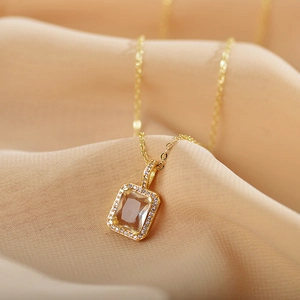 Luxurious emerald cut gemstone necklace with zircon pendant on golden titanium steel chain