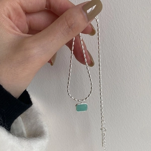 Detailed view of an S925 silver necklace featuring a rectangular green amazonite pendant