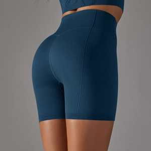 Détail du short de yoga bleu marine sans couture à taille haute avec texture nid d'abeille