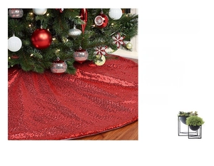 Detail of red sequins stitched on mesh fabric for a festive Christmas tree skirt base