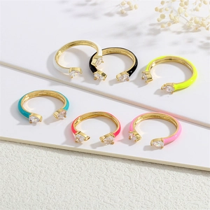 Set of 6 gold adjustable rings with colorful enamel finishes and pear-cut cubic zirconia