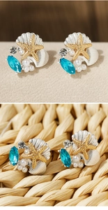 Detail of starfish and shell earrings with blue gemstones and white pearls for women
