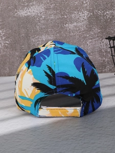 Detail view of tropical palm tree print cap with adjustable back strap closure