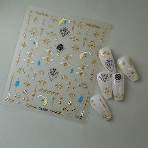 5D gold nail art stickers with sun and star symbols for bohemian manicure decoration