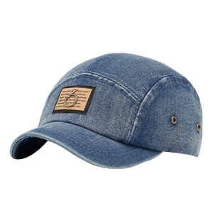 Blue denim short brim baseball cap with five-panel structure and metal ring detail