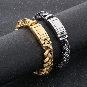 Close-up of gold and silver chunky twist chain bracelets with rectangular push clasps