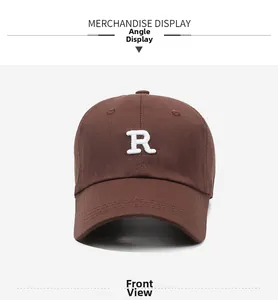 Detailed front view of a dark brown cotton baseball cap featuring 3D white R embroidery