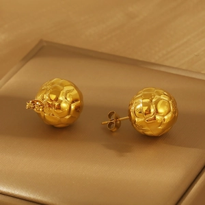 Elegant gold-tone soccer ball stud earrings with detailed football texture and metallic finish