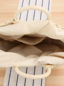 Minimalist handmade woven paper rope tote bag with cotton lining and interior pocket