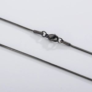 Classic black snake bone chain necklace with lobster clasp against a white background