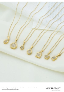 Collection of seven gold titanium steel necklaces with sparkling zircon pendant shapes
