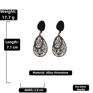 Detailed view of teardrop rhinestone earrings showing 7.1cm length and 925 silver needles