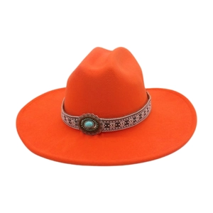 Detail of orange wool fedora featuring ethnic pattern band and turquoise metal buckle