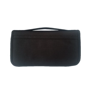 Back view of a black nylon travel organizer with durable fabric and integrated keychain