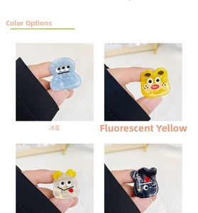 Detailed views of mini acetate hair claws in ice blue, yellow, white, and black colors