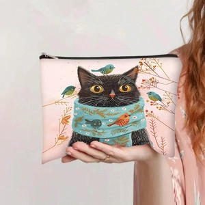 Gros plan sur la trousse en toile chat noir avec yeux jaunes rétro et motif écharpe