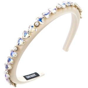 Detail of handmade padded headband with iridescent crystal hearts and small white pearls