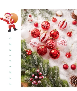 Detailed view of red and white Christmas ornaments with glitter and snowflake patterns