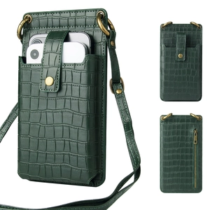 Detail of dark green crocodile pattern leather phone bag with card slots and zipper