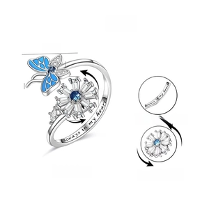 Silver rotating butterfly spinner ring for anxiety relief with blue enamel and zircon