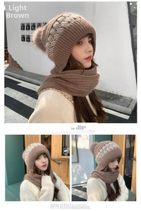 Dettaglio del cappello in maglia color caffè chiaro con pompon e sciarpa invernale spessa