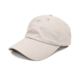 Detail view of cotton twill baseball cap showing six-panel stitching and beige fabric texture