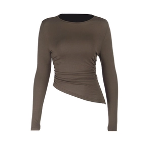 Detail view of coffee brown long sleeve top with ruched side and asymmetrical hemline