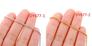 Detail of 18k gold and silver rope chains showing twisted texture and slim design